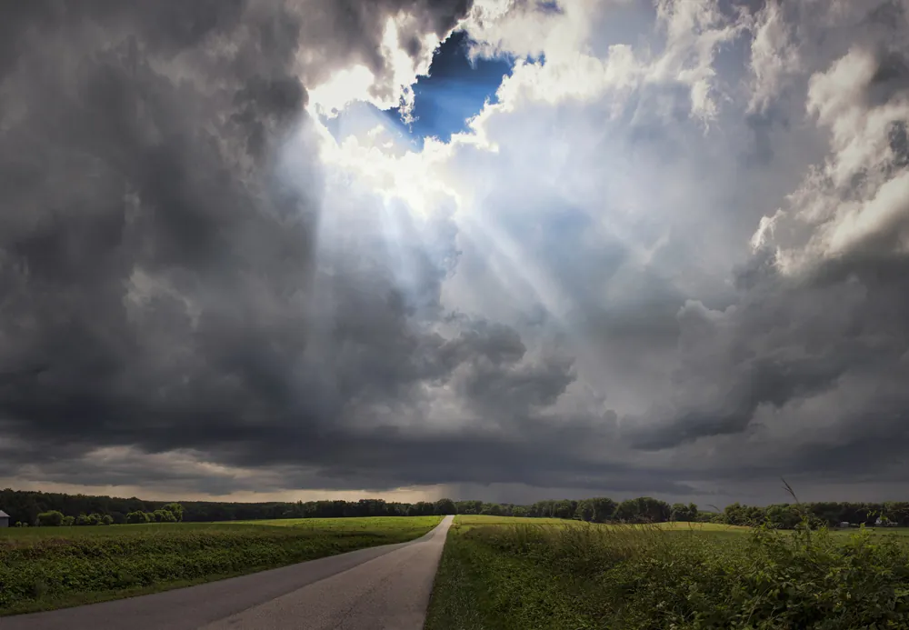 Sun breaking through clouds